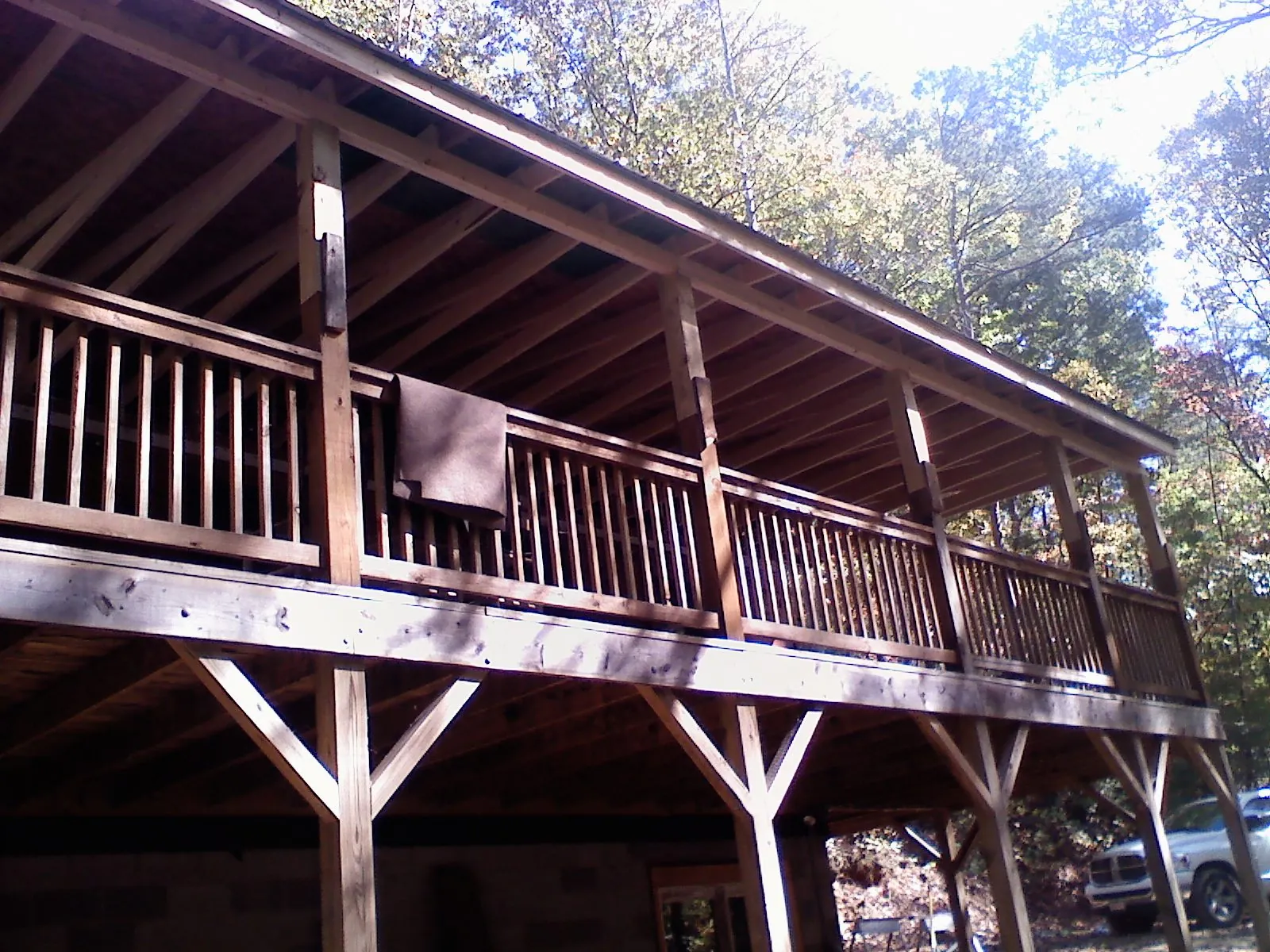Timber framing under a new elevated porch and deck — Roof Leak Repair in Justin by Roofing Brothers